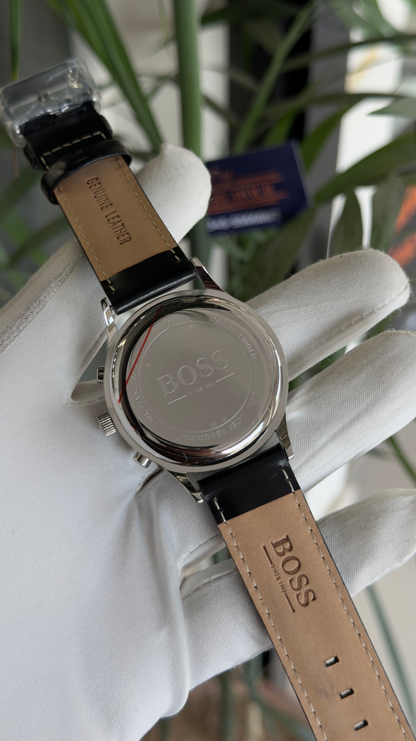 Silver with blue dial and brown strap