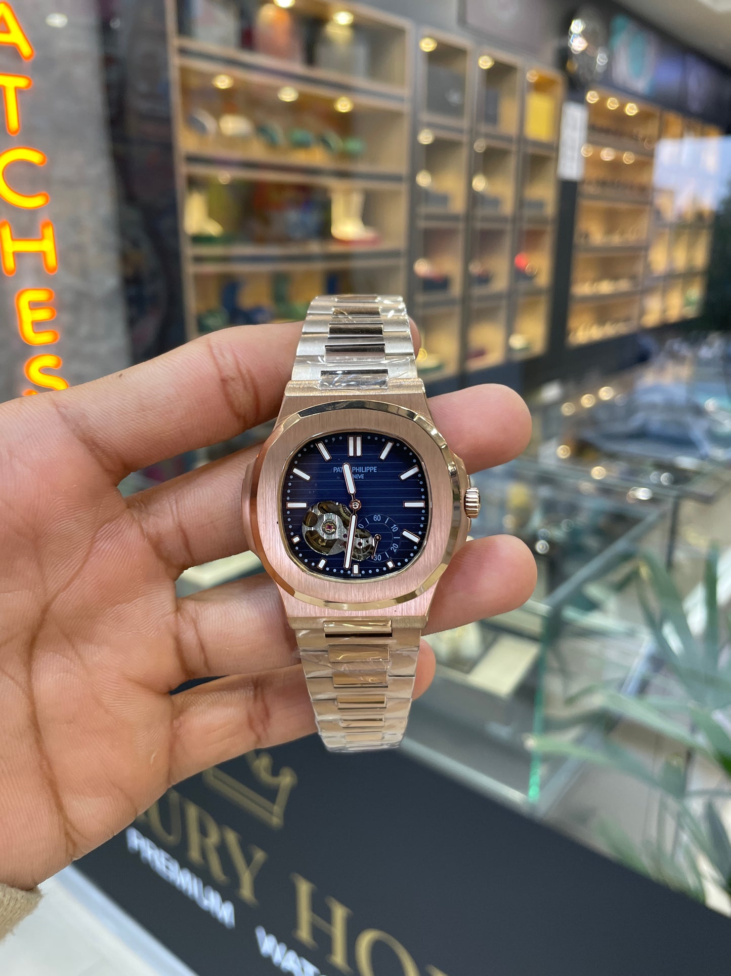 Rose gold with blue dial