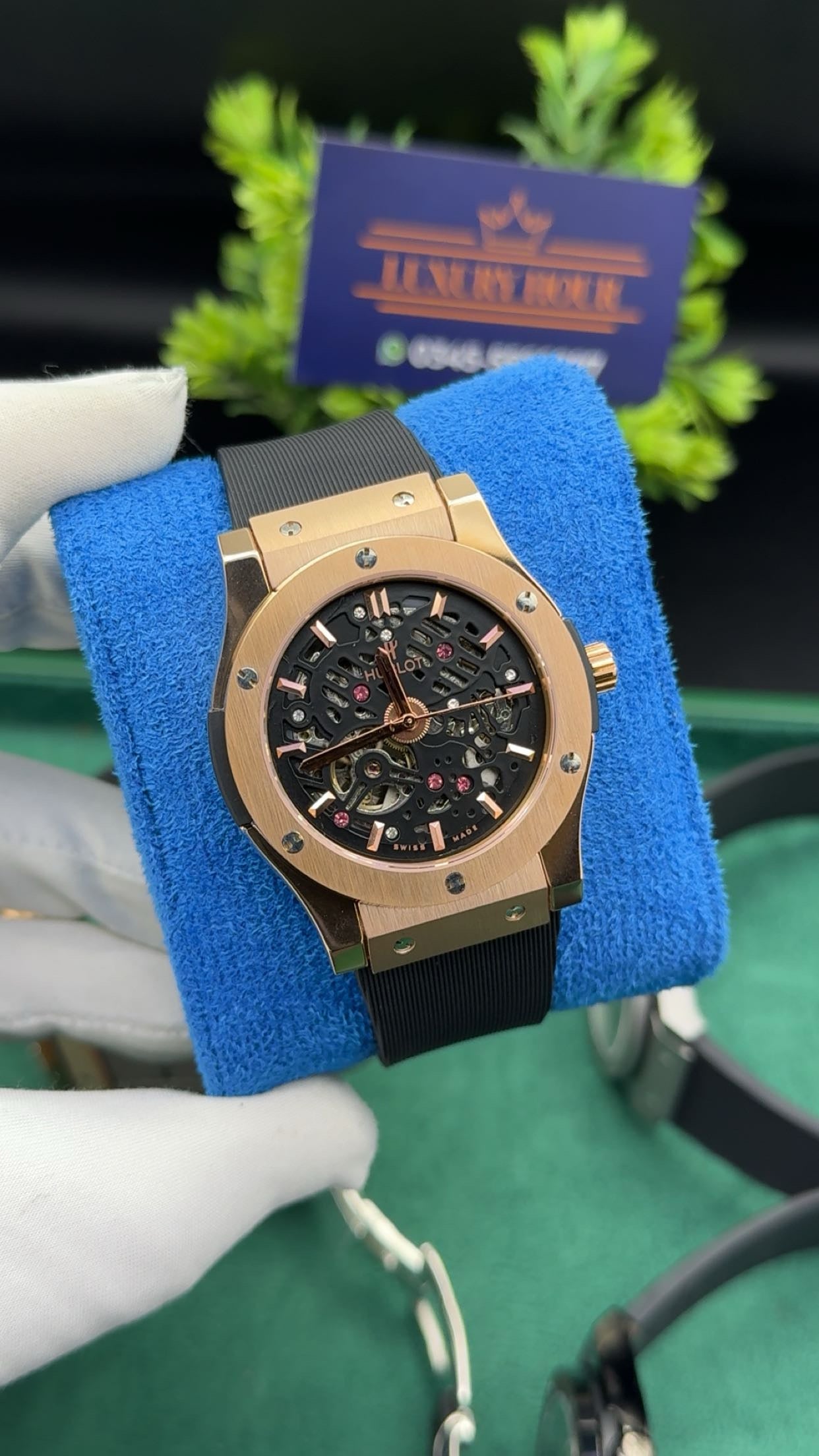 Rose gold with black dial