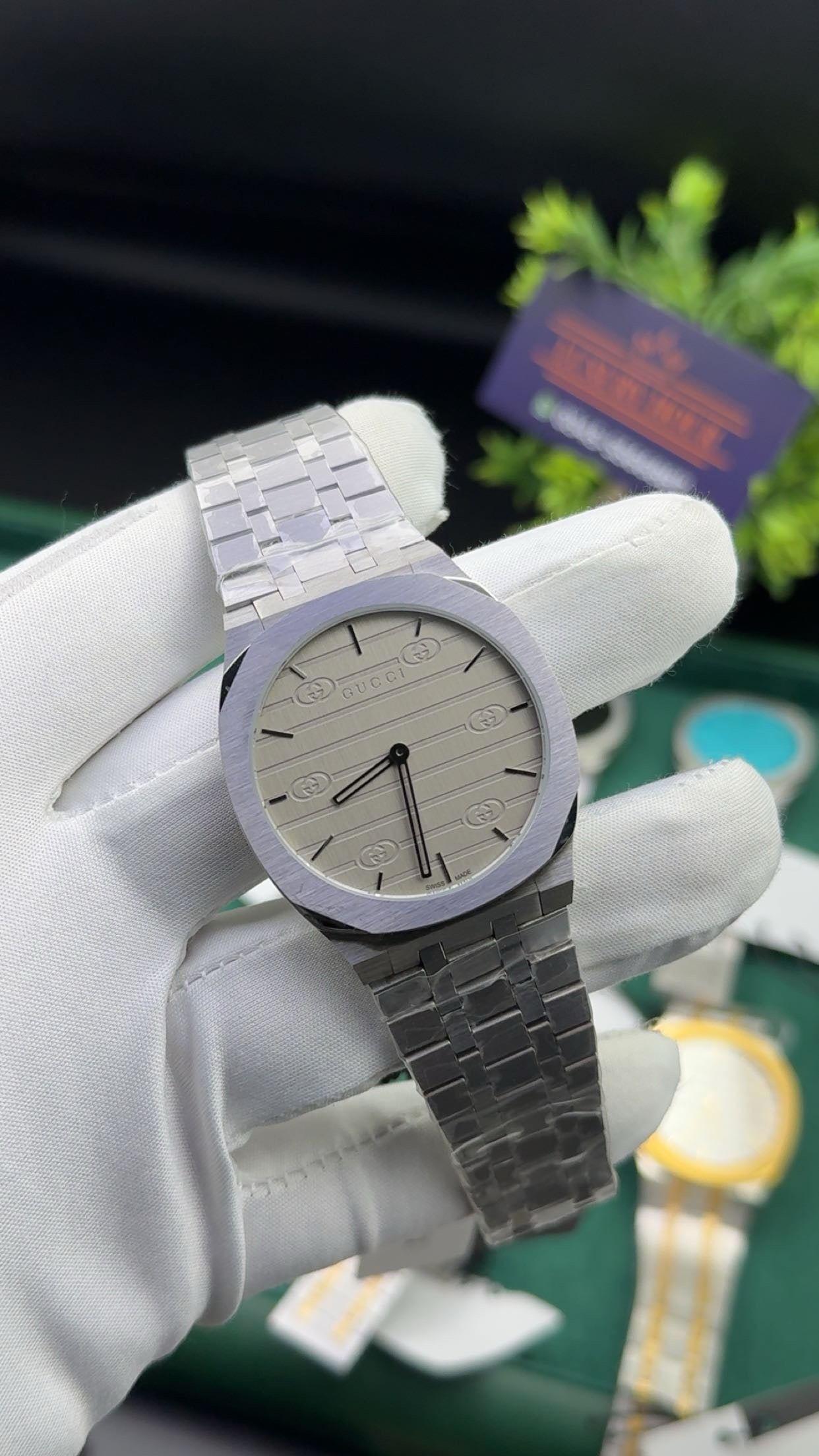 Silver with grey dial