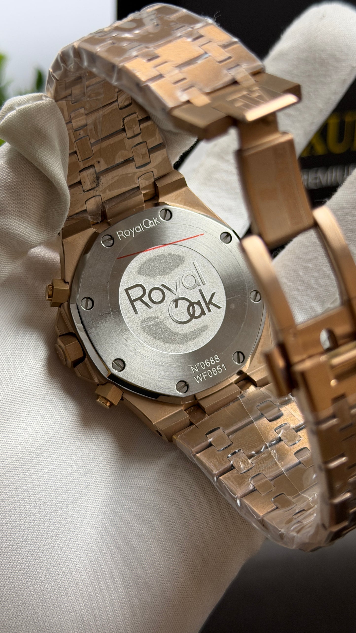 Rose Gold with Black Dial.