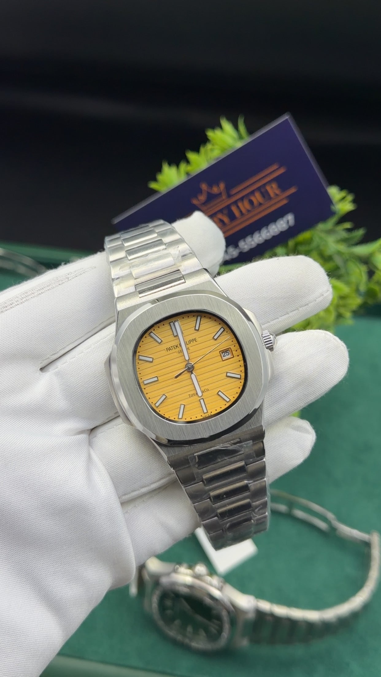 Silver with yellow dial