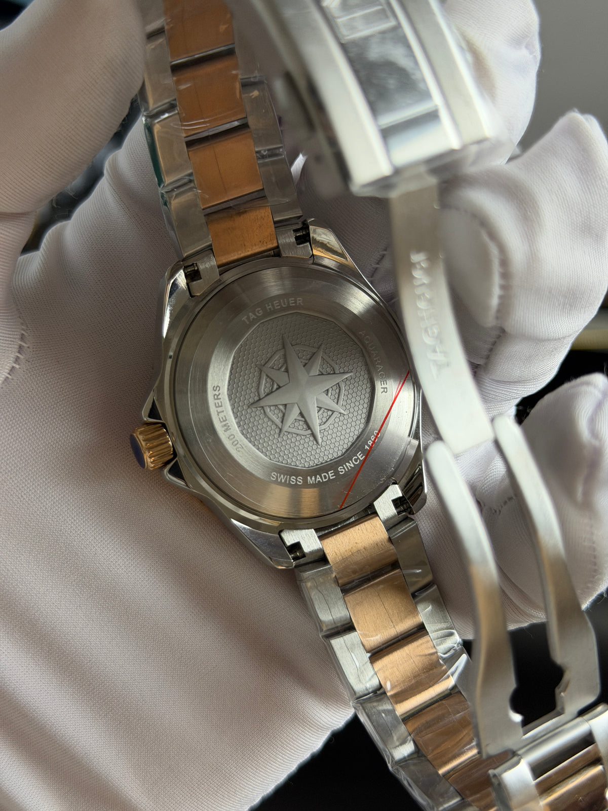 Rose Gold Two Tone with Black Dial.