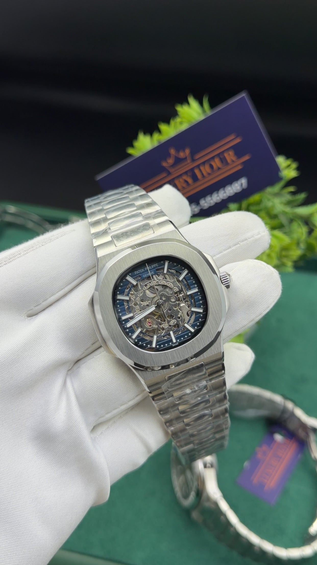 Silver with blue dial skeleton