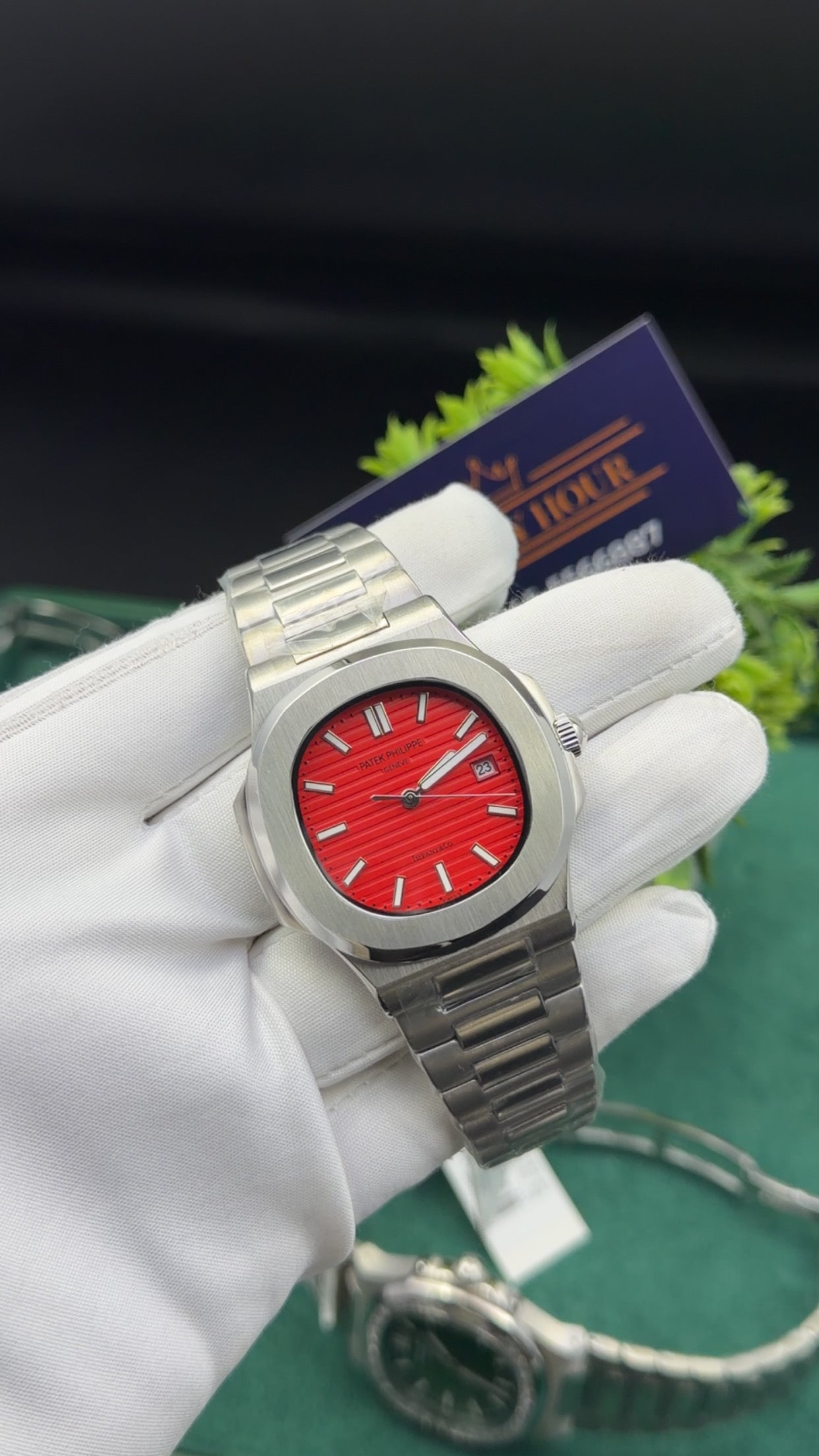Silver with red dial