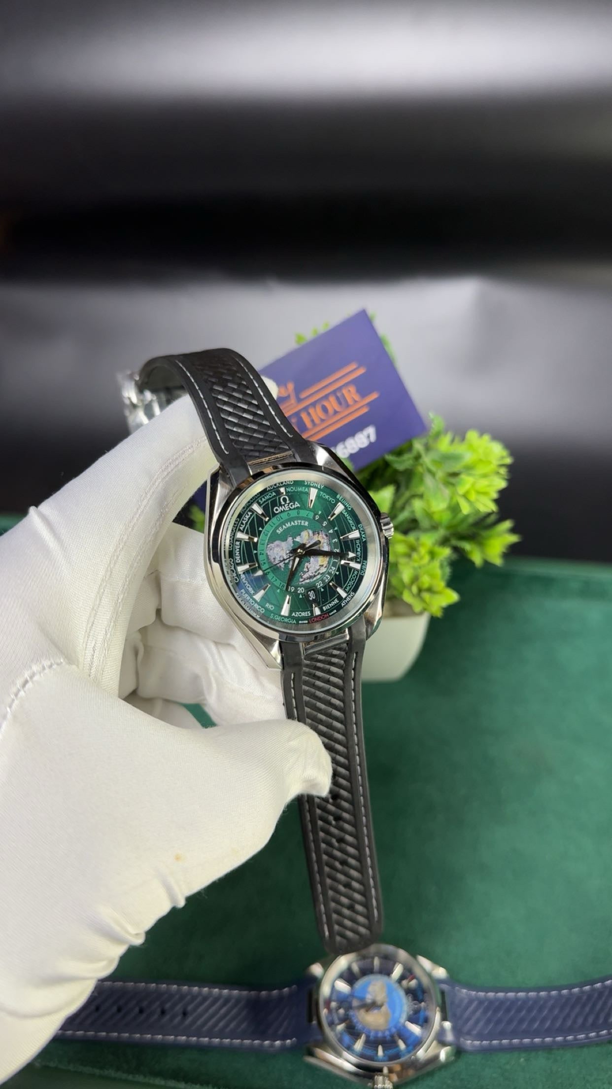 Silver with green dial