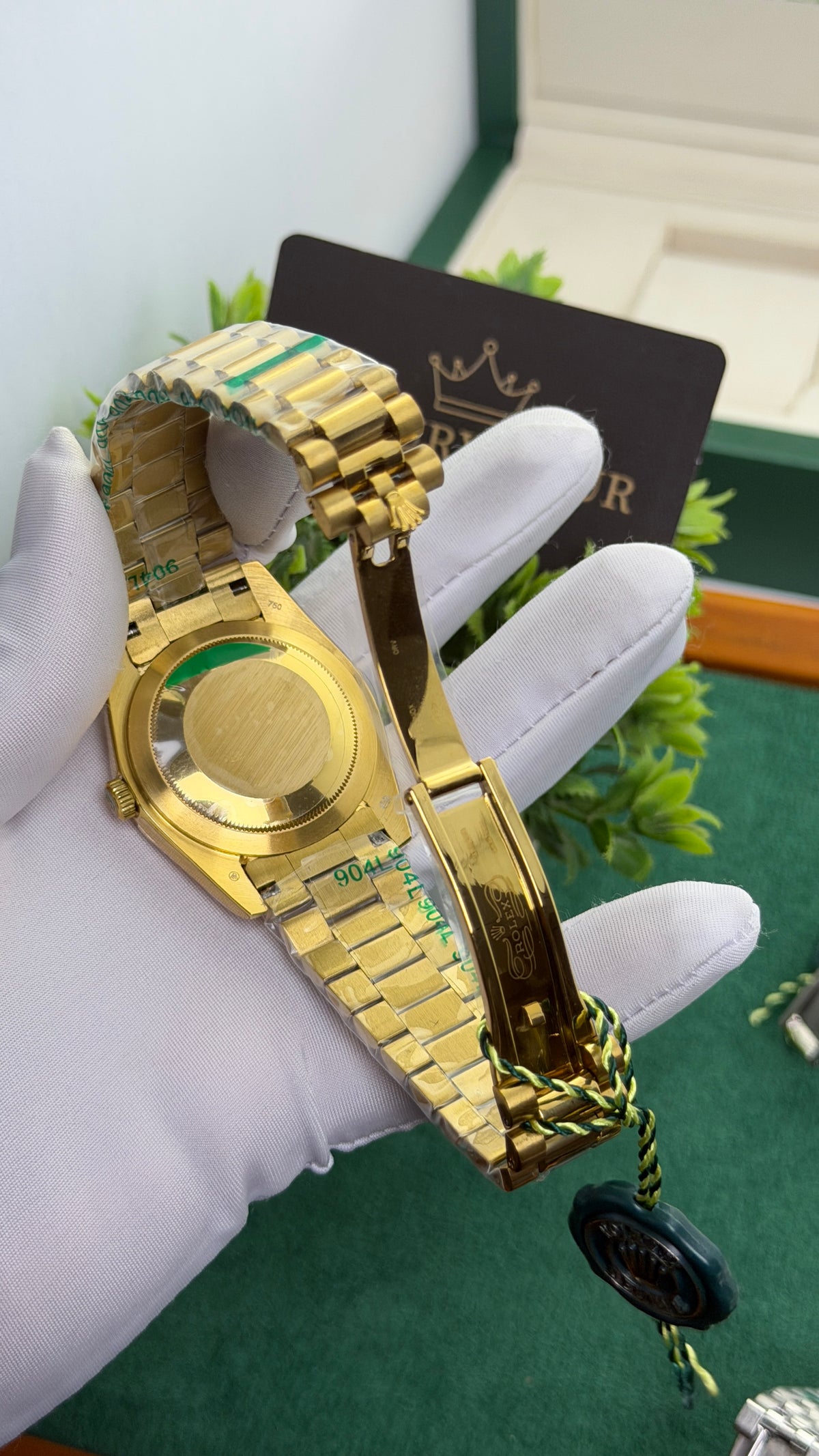 Yellow Gold with Green Marble Dial.