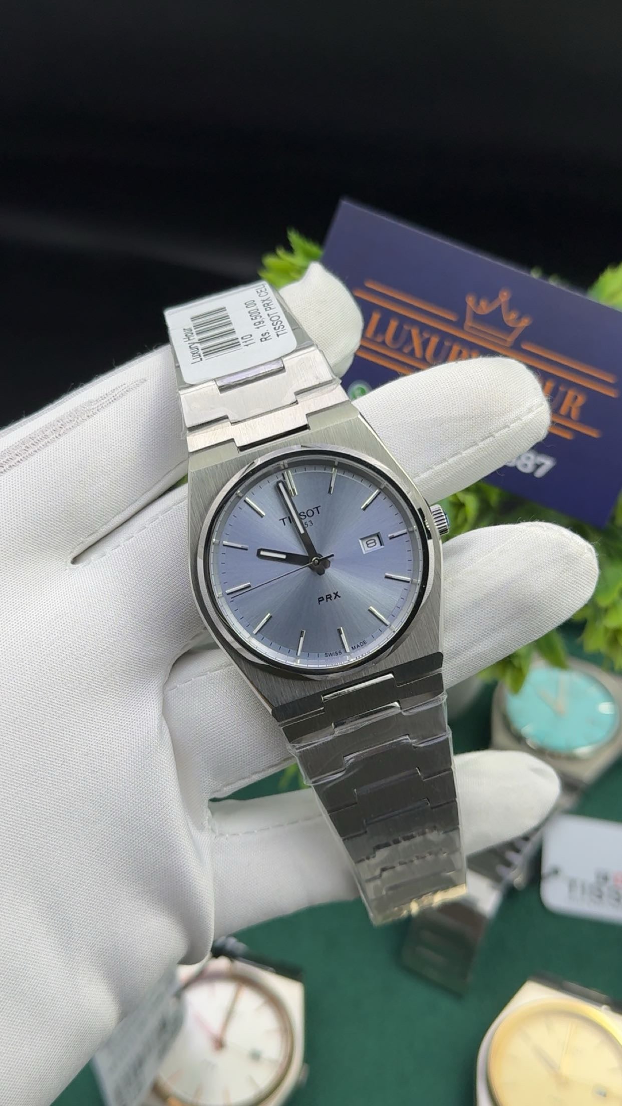 Silver with sky blue dial