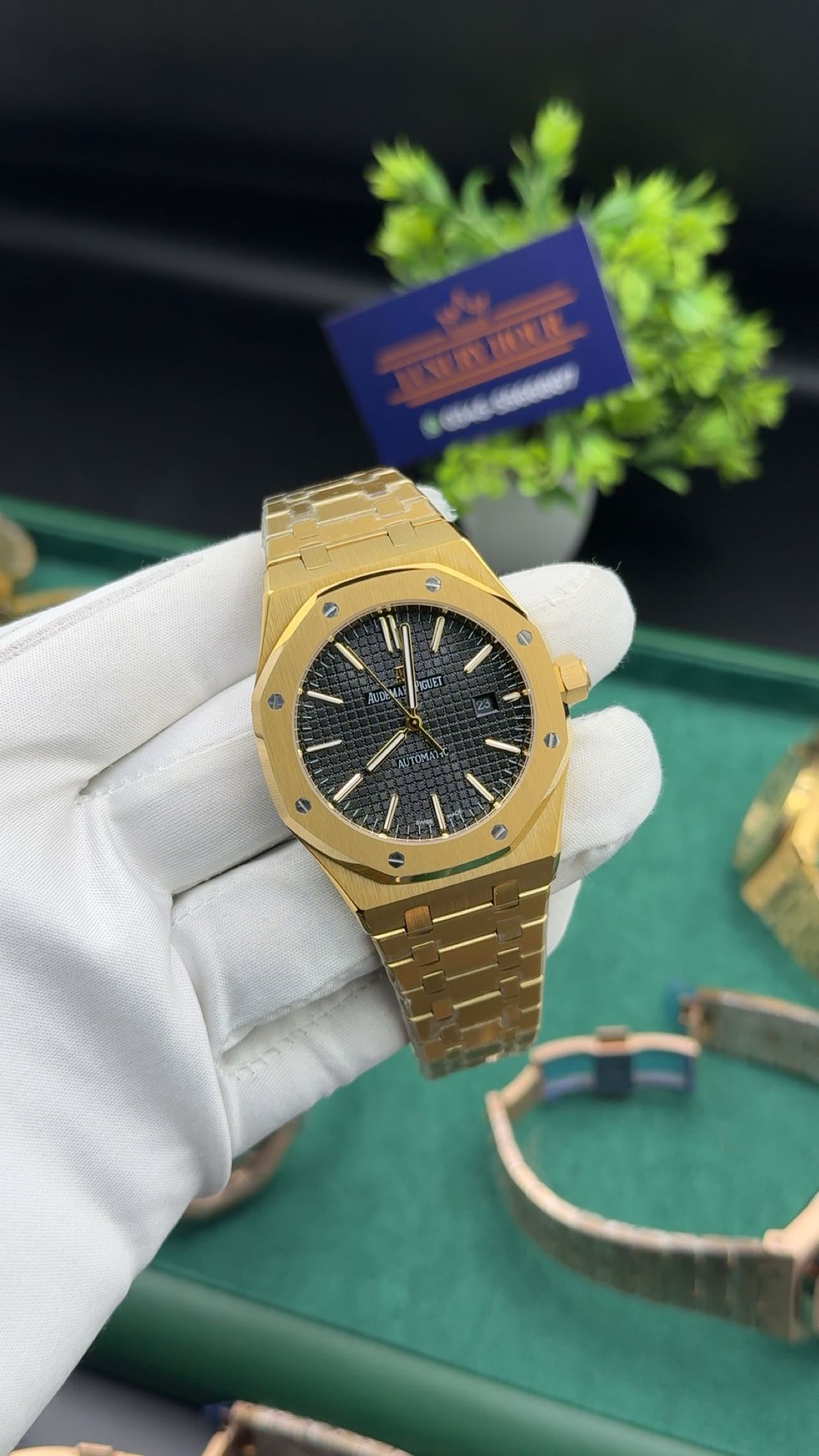 Yellow gold with black dial