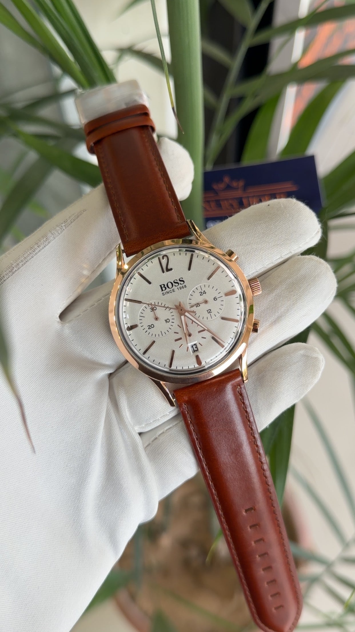 Rose gold with white dial brown strap