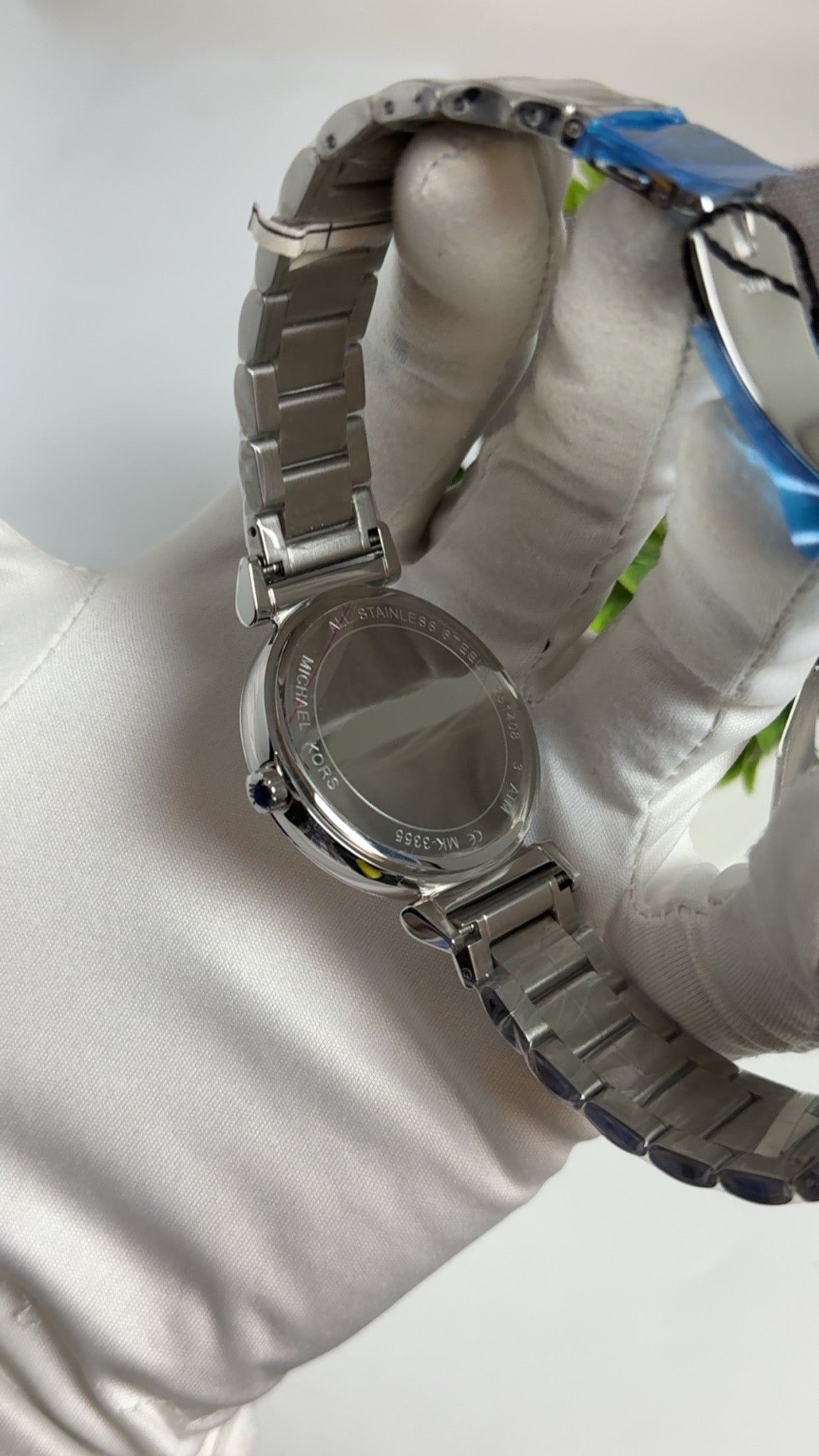 Silver with Diamond Dial.