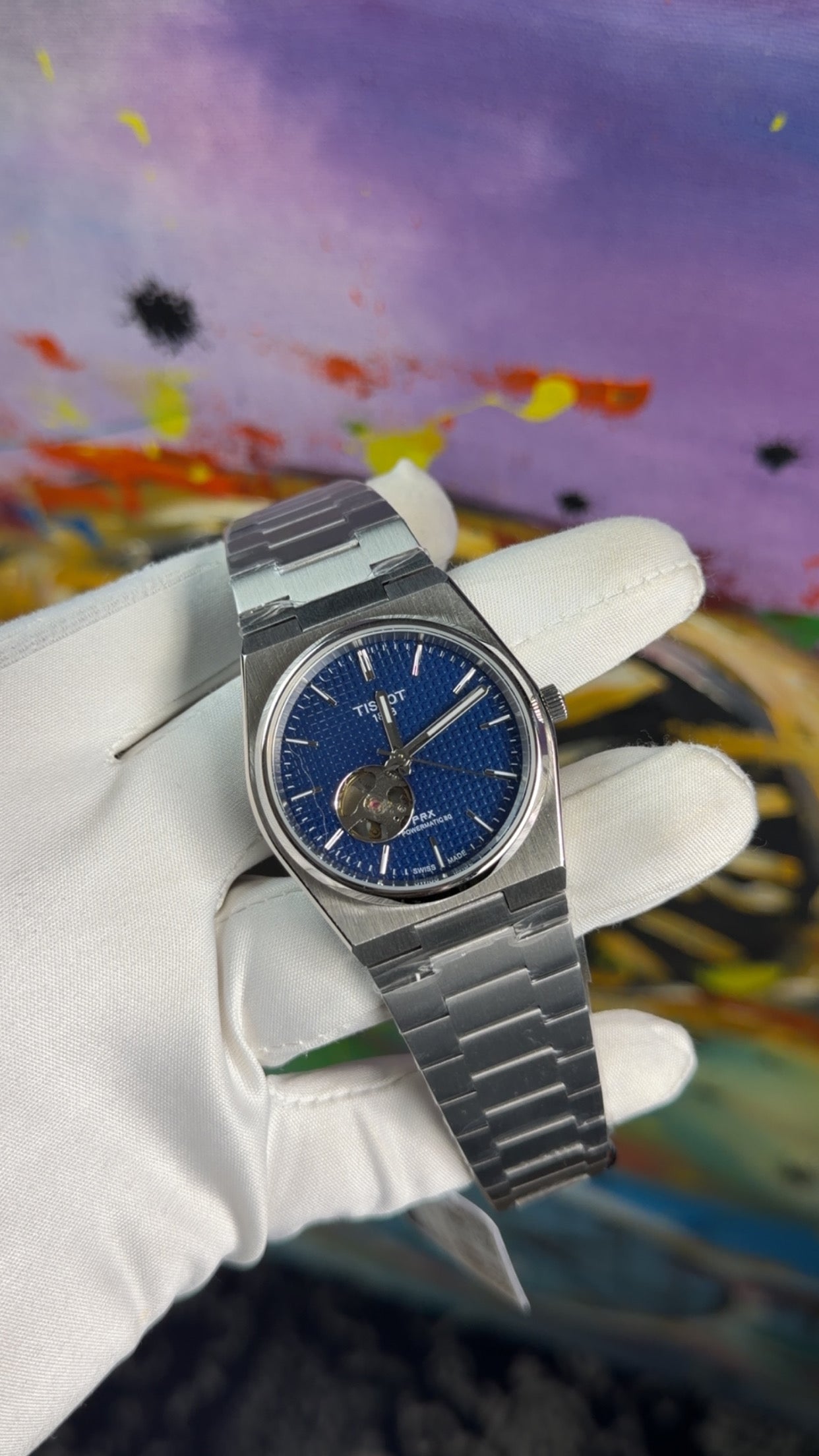 Silver with Blue Dialš„