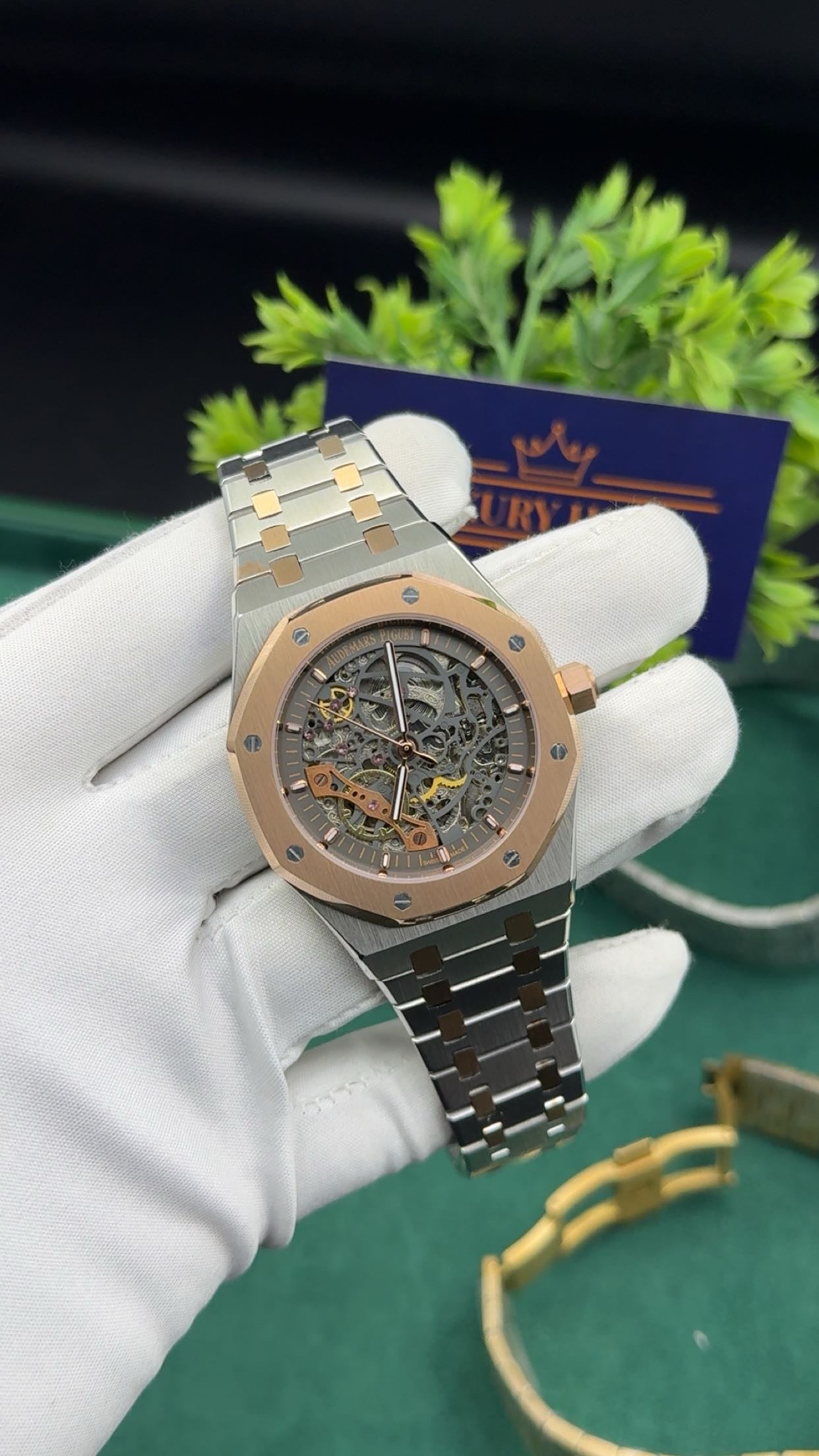 Rose gold two tone with grey dial