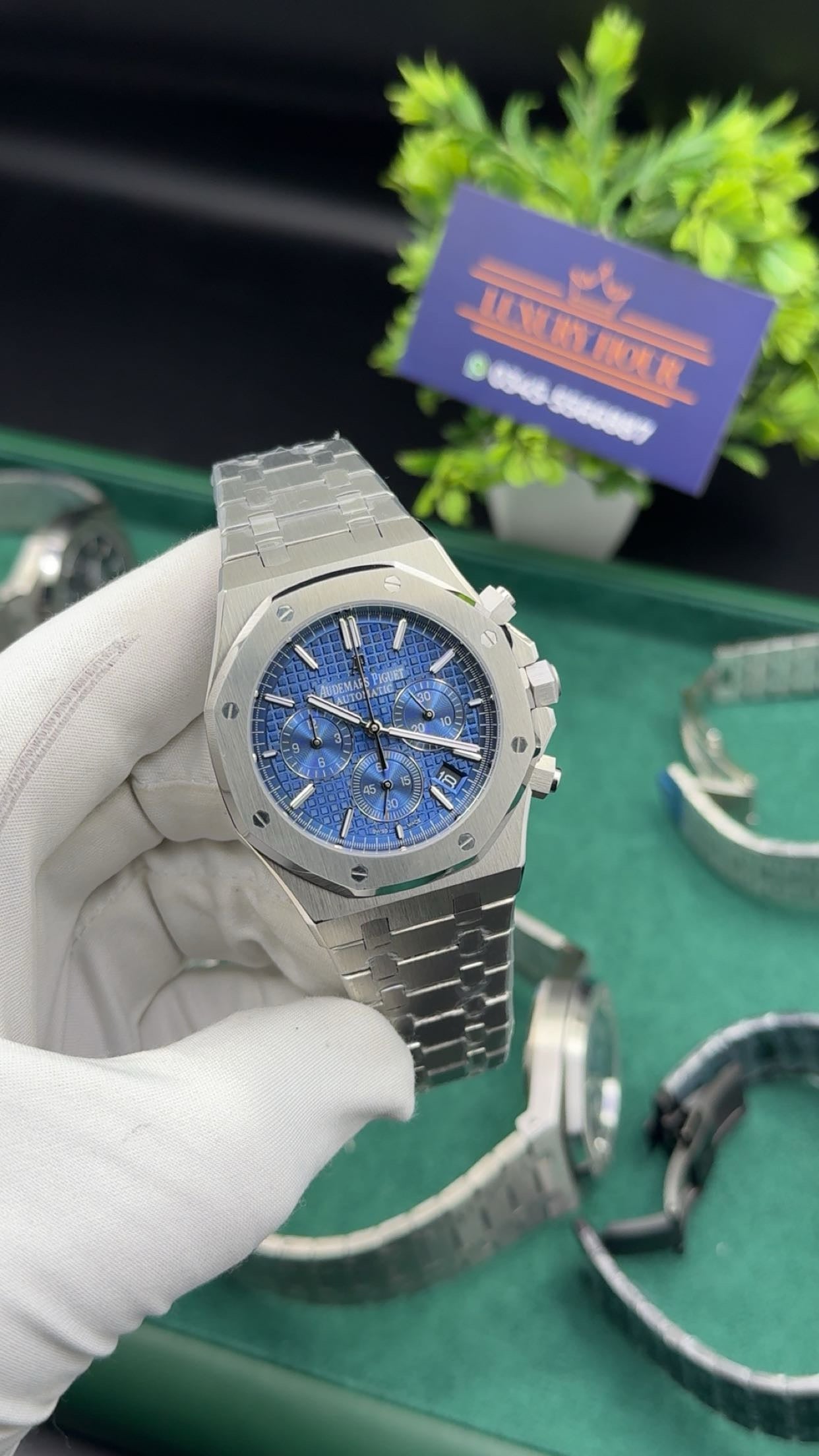 Silver with blue dial