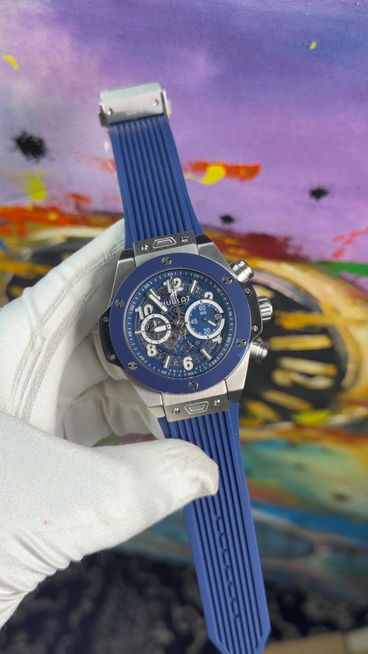 Silver with blue dial