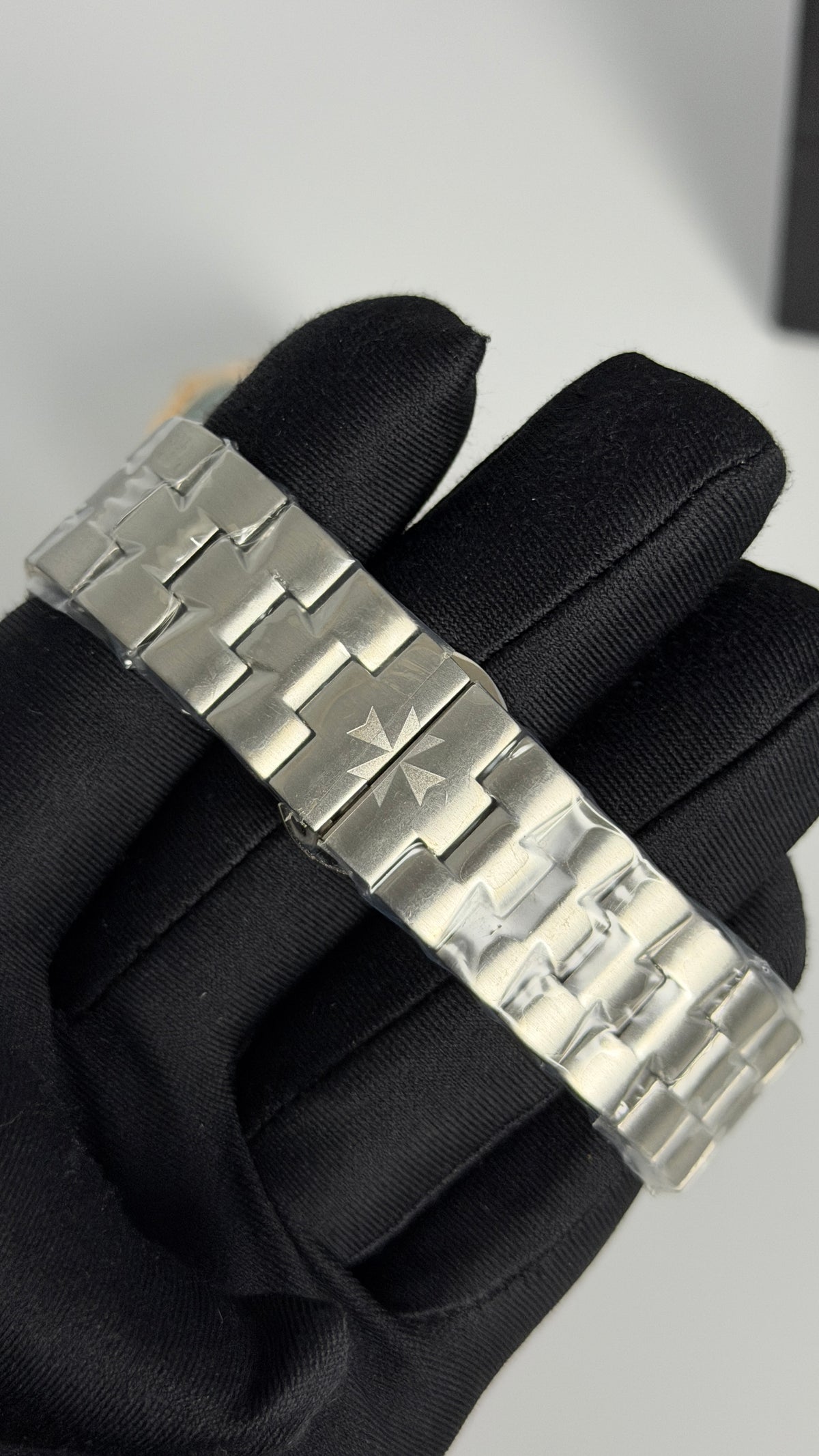 Silver with Aqua Dial.