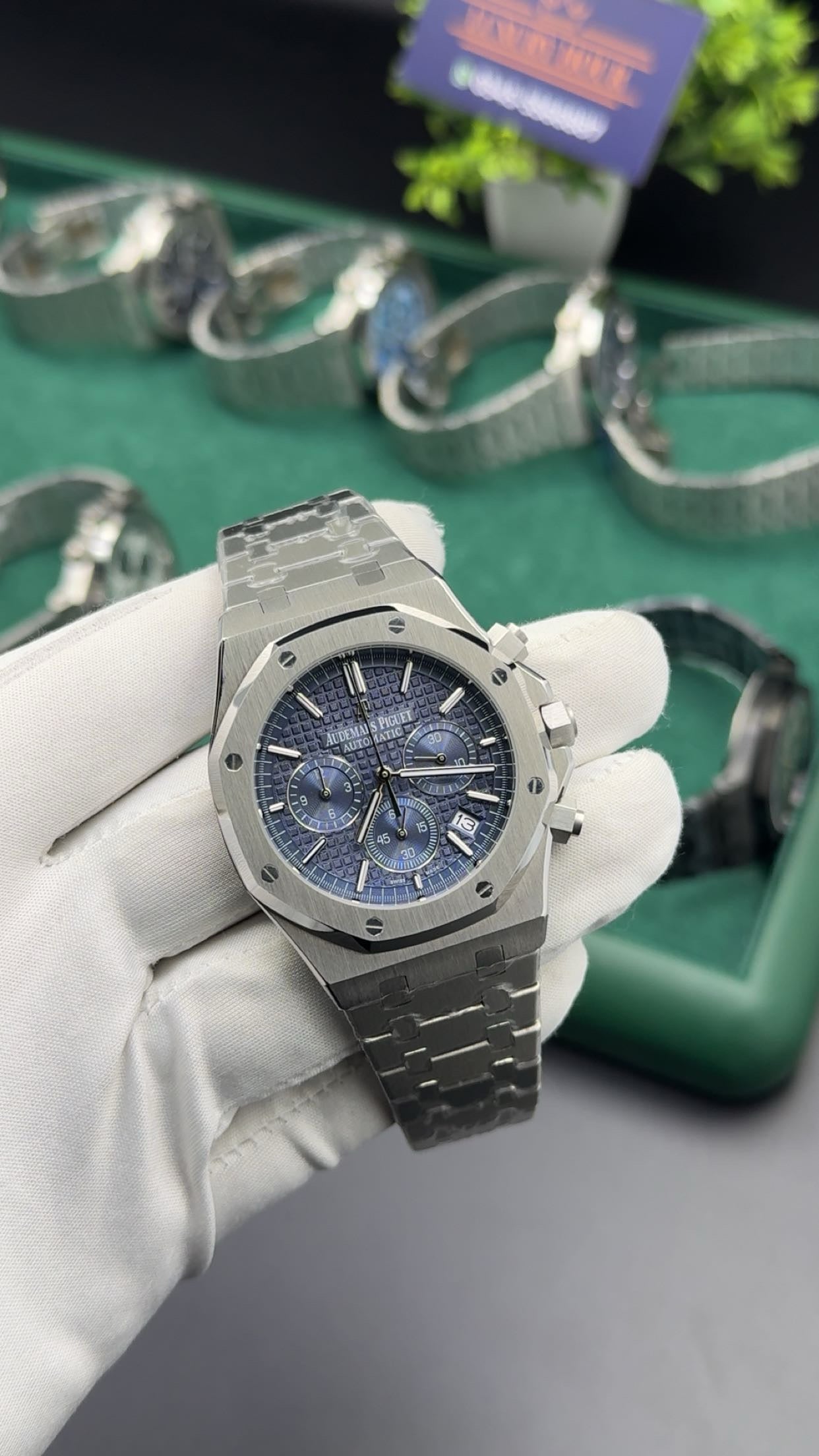 Silver with blue dial