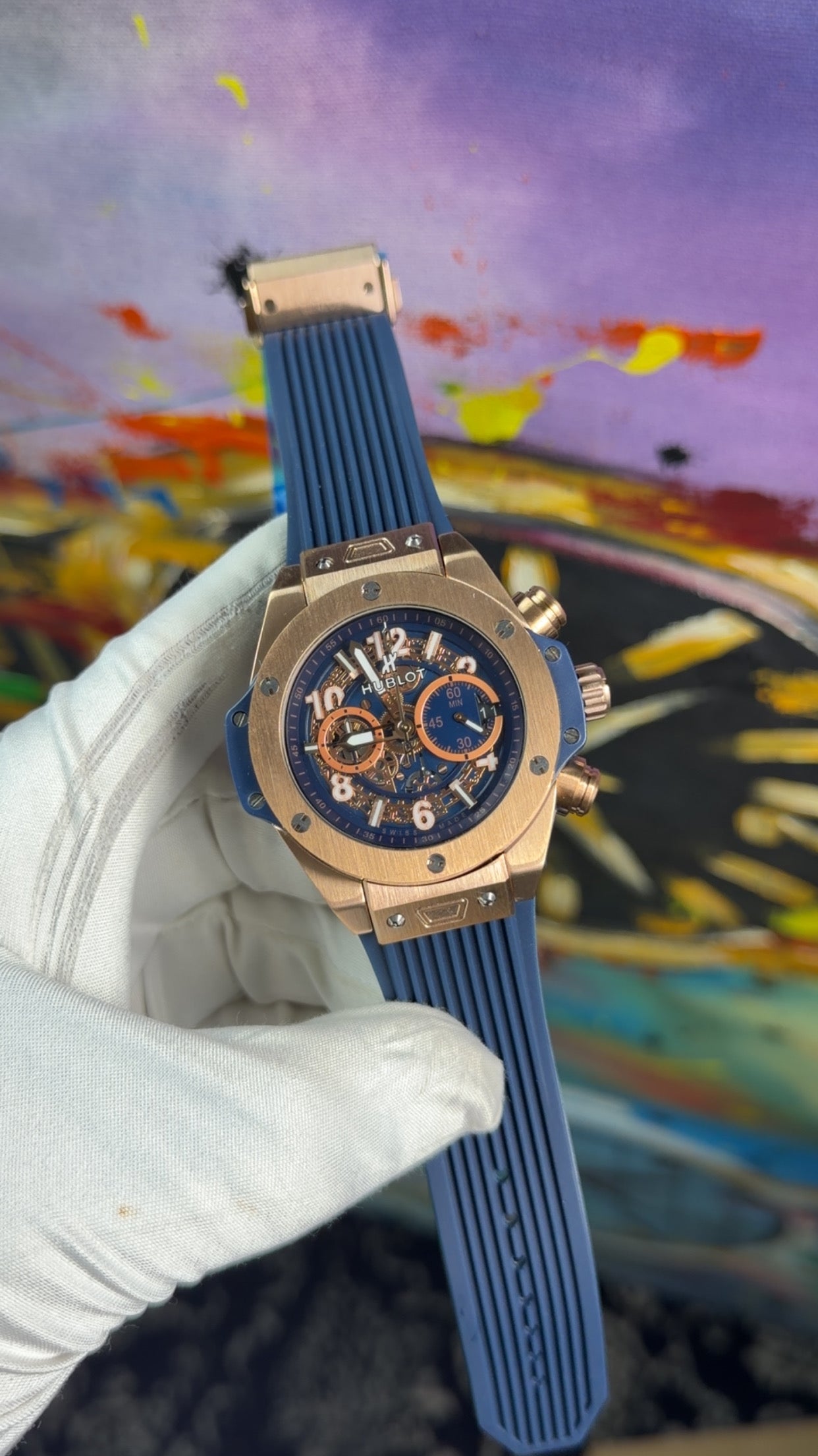 Rose gold with blue dial