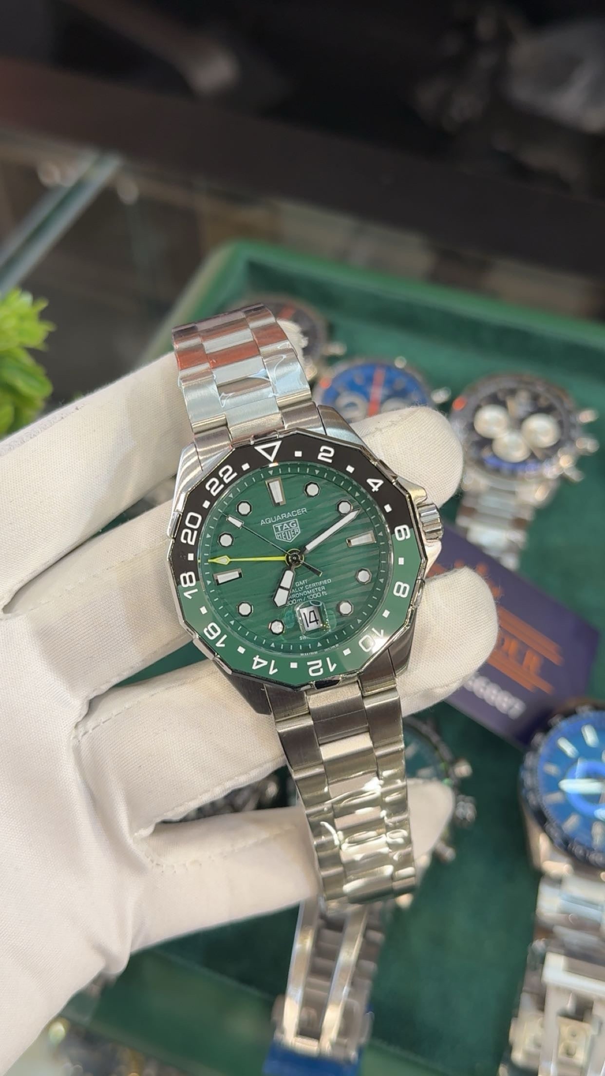 Silver with green dial