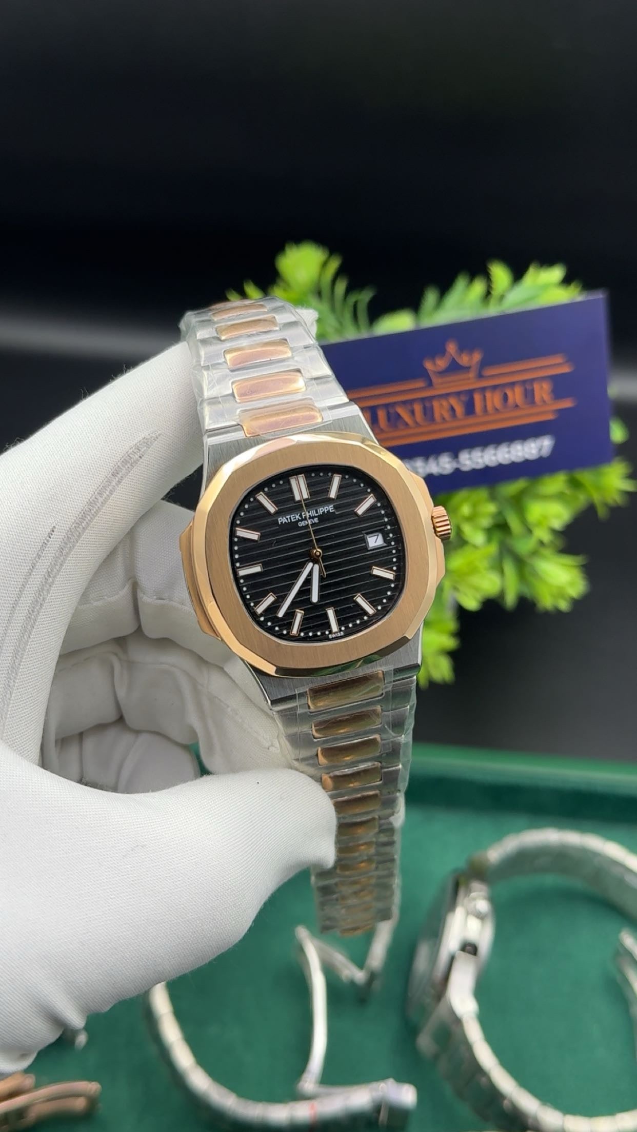 Rose gold two tone with black dial