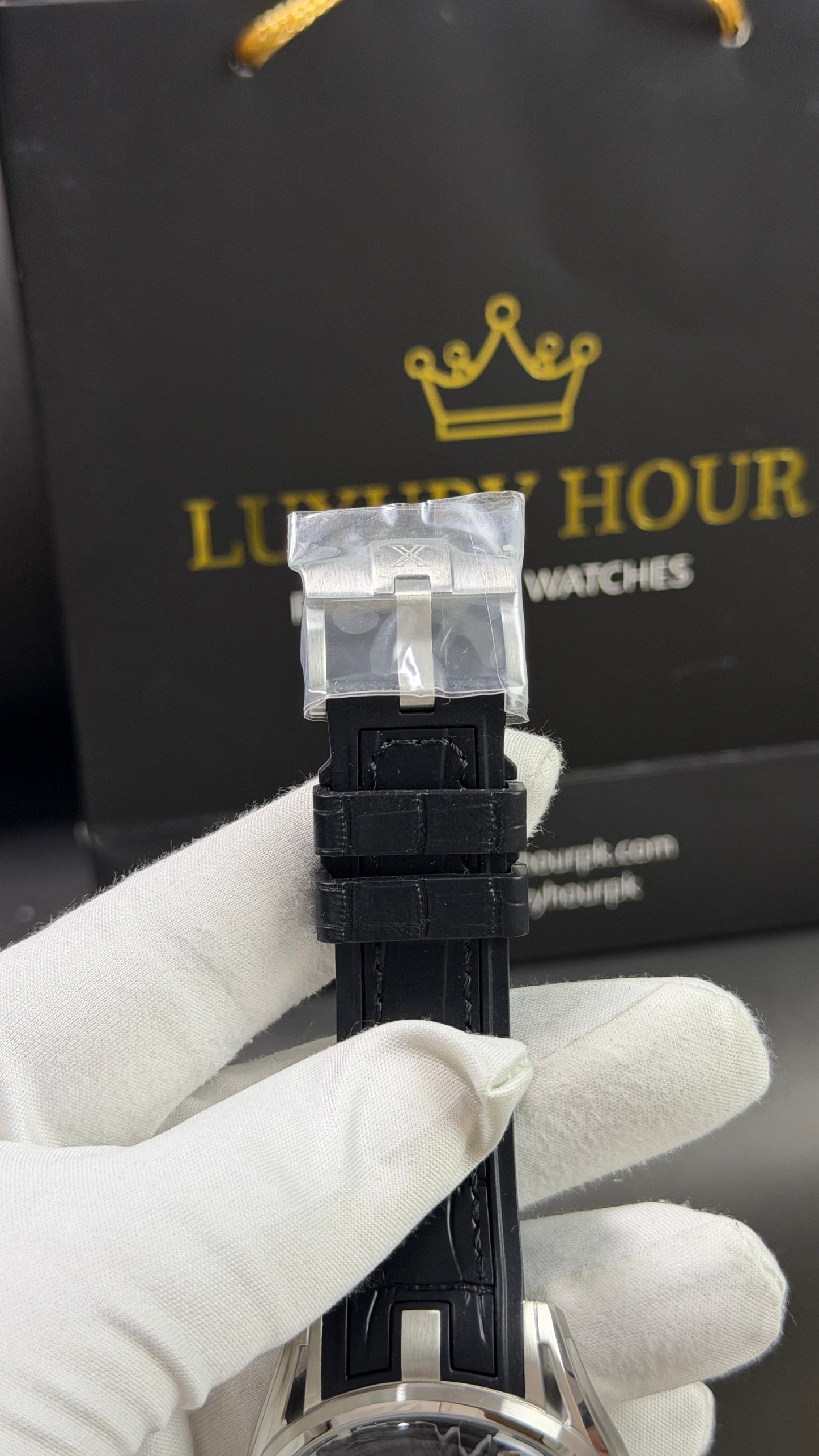 Silver with Black Skeleton Dial. ( 100% Original )