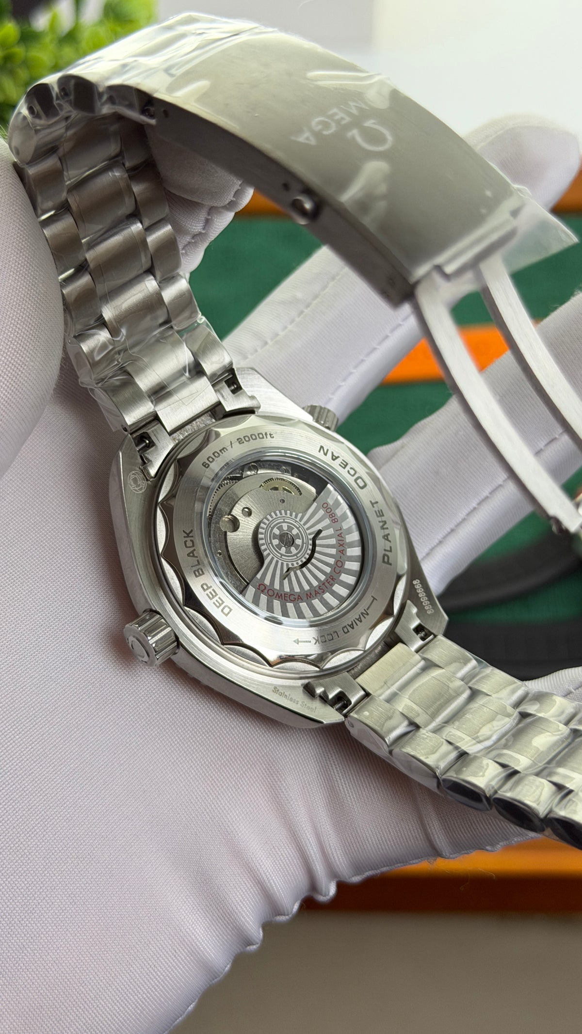 Silver with Blue Dial.