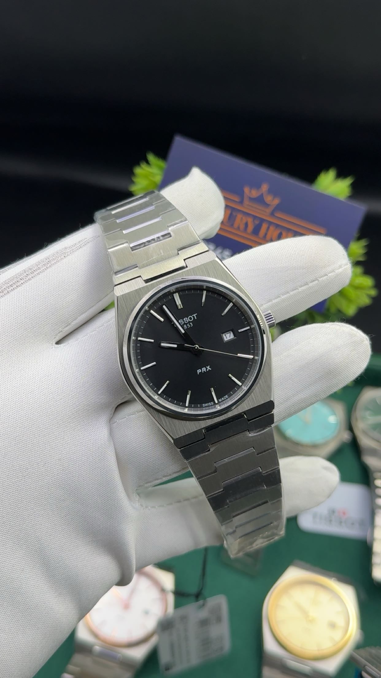 Silver with black dial