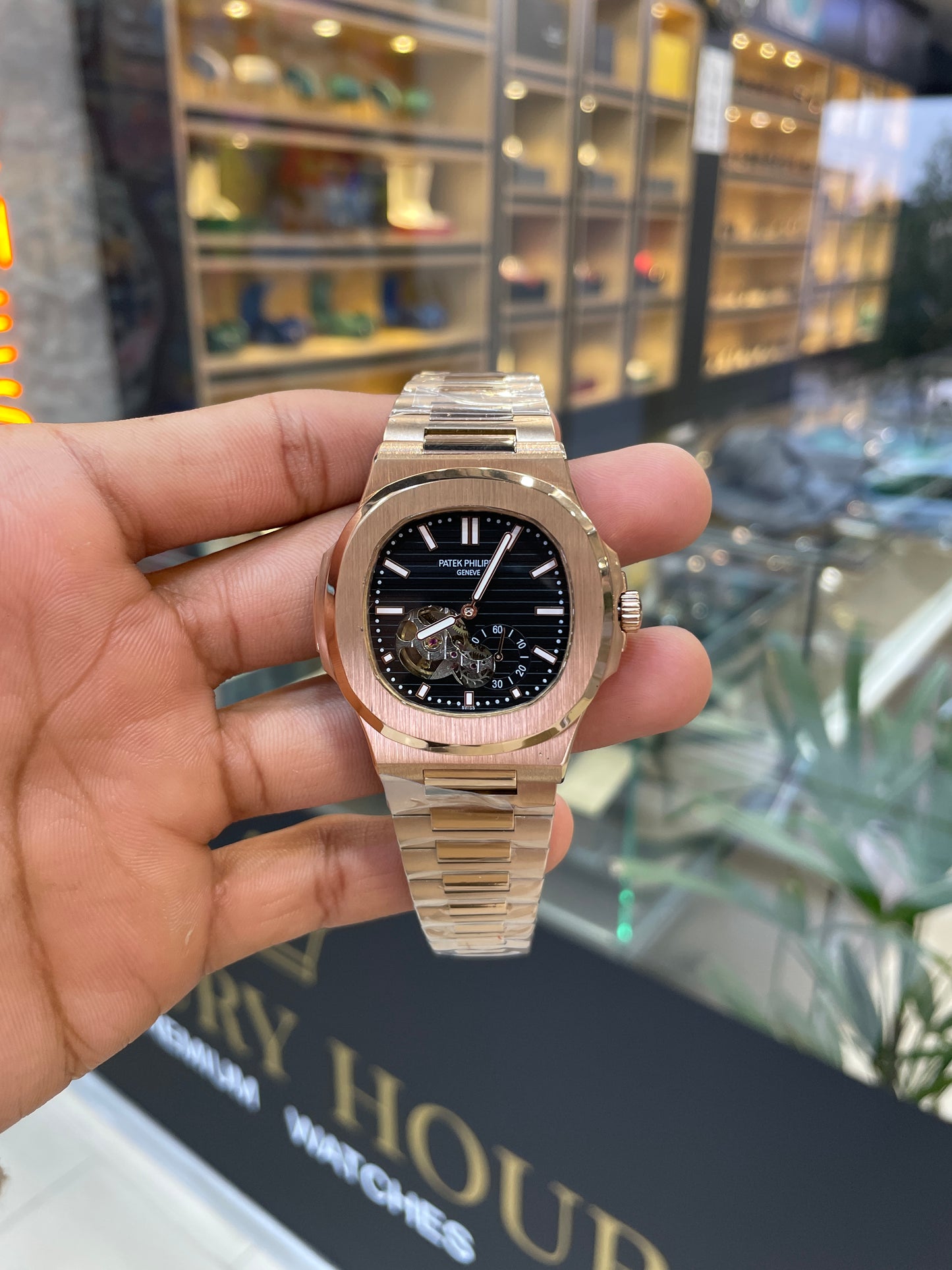 Rose gold with black dial