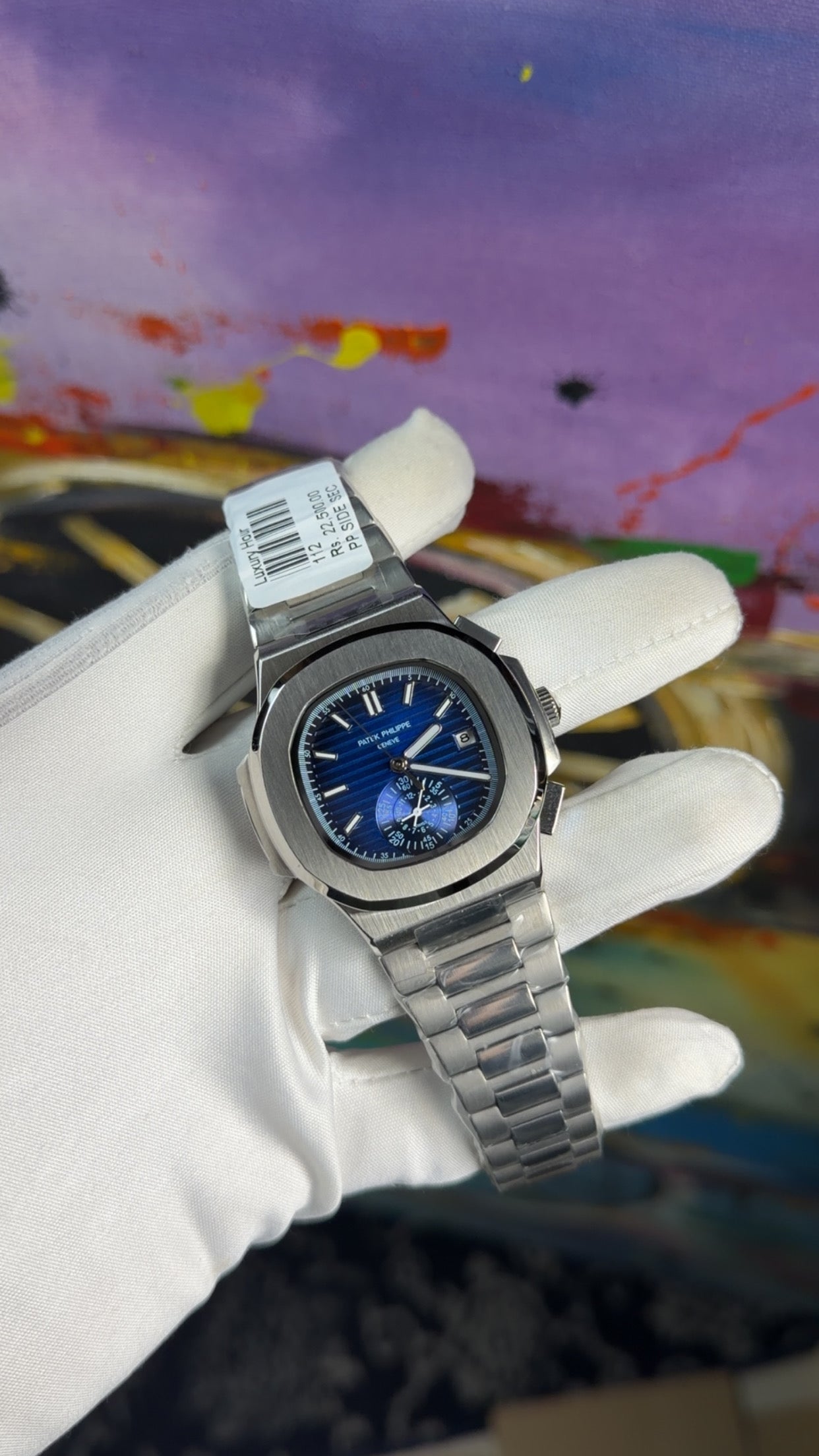Silver with blue dial