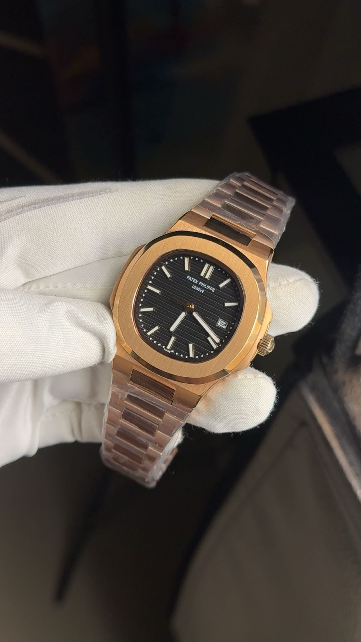 Rose gold with black dial