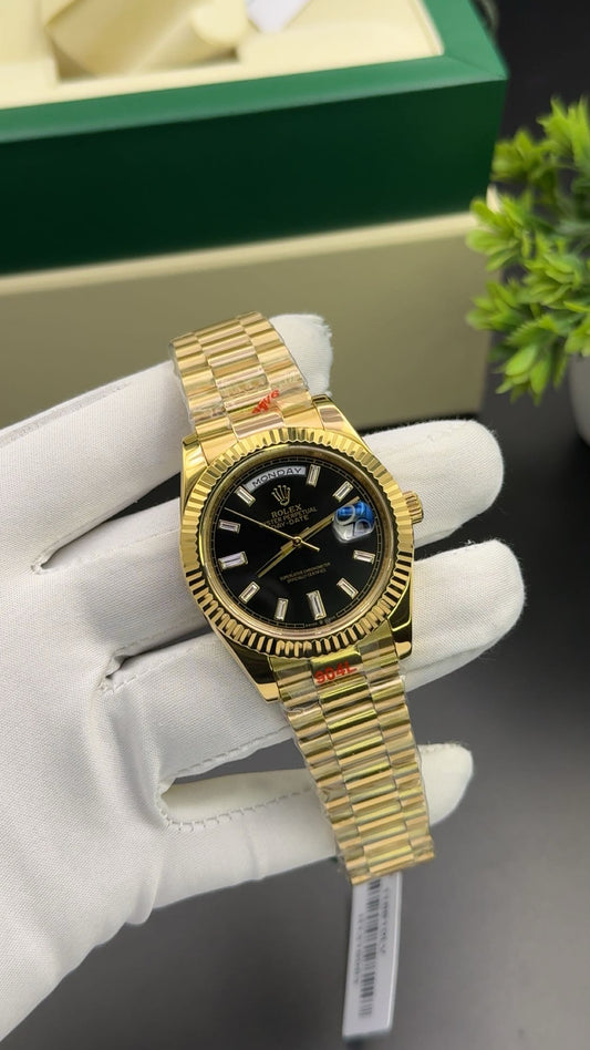 Yellow gold with black dial
