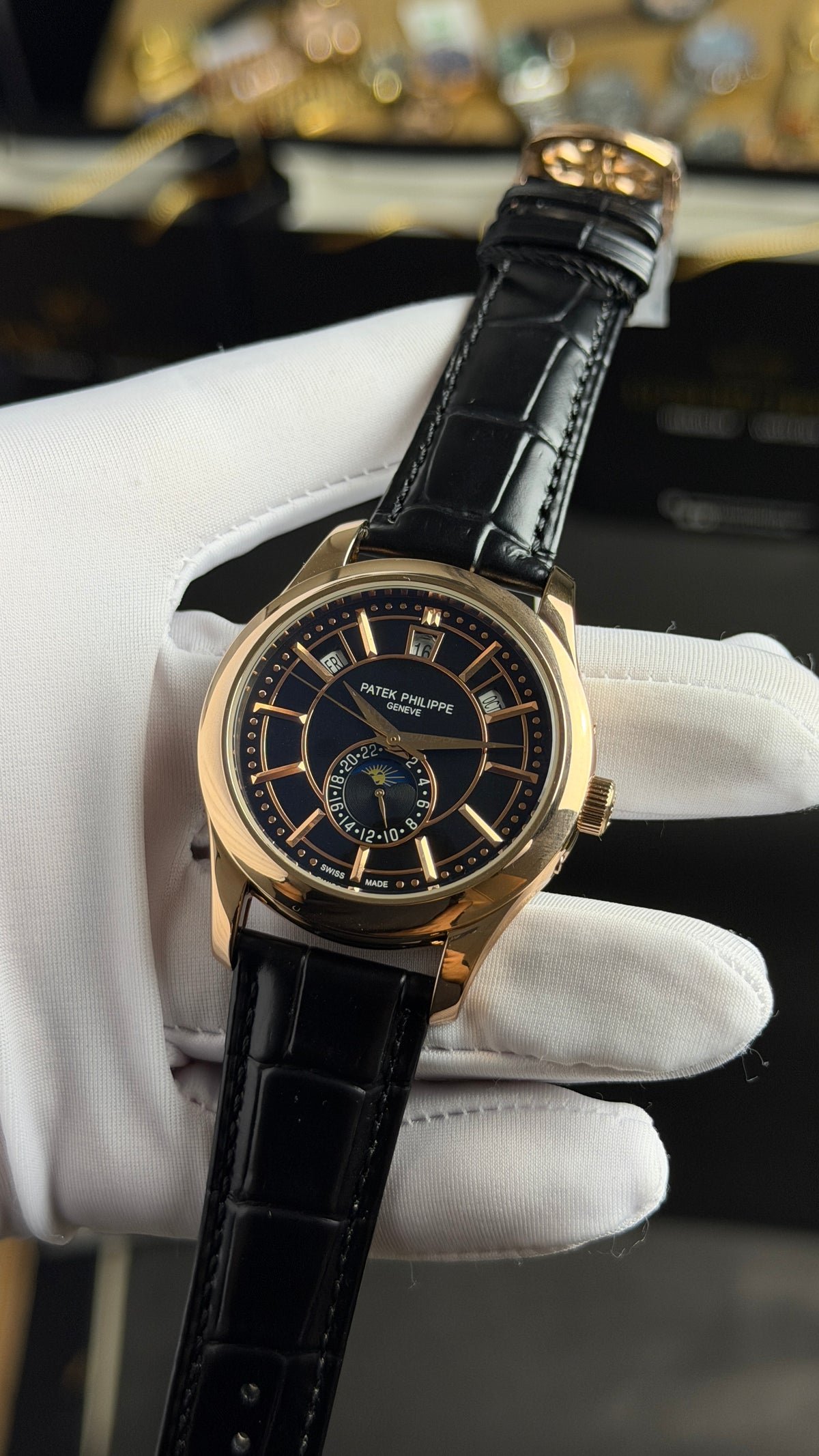 Rose Gold with Black Dial.