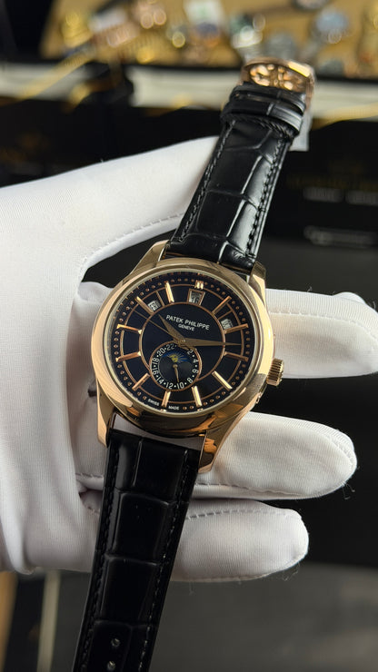 Rose Gold with Black Dial.
