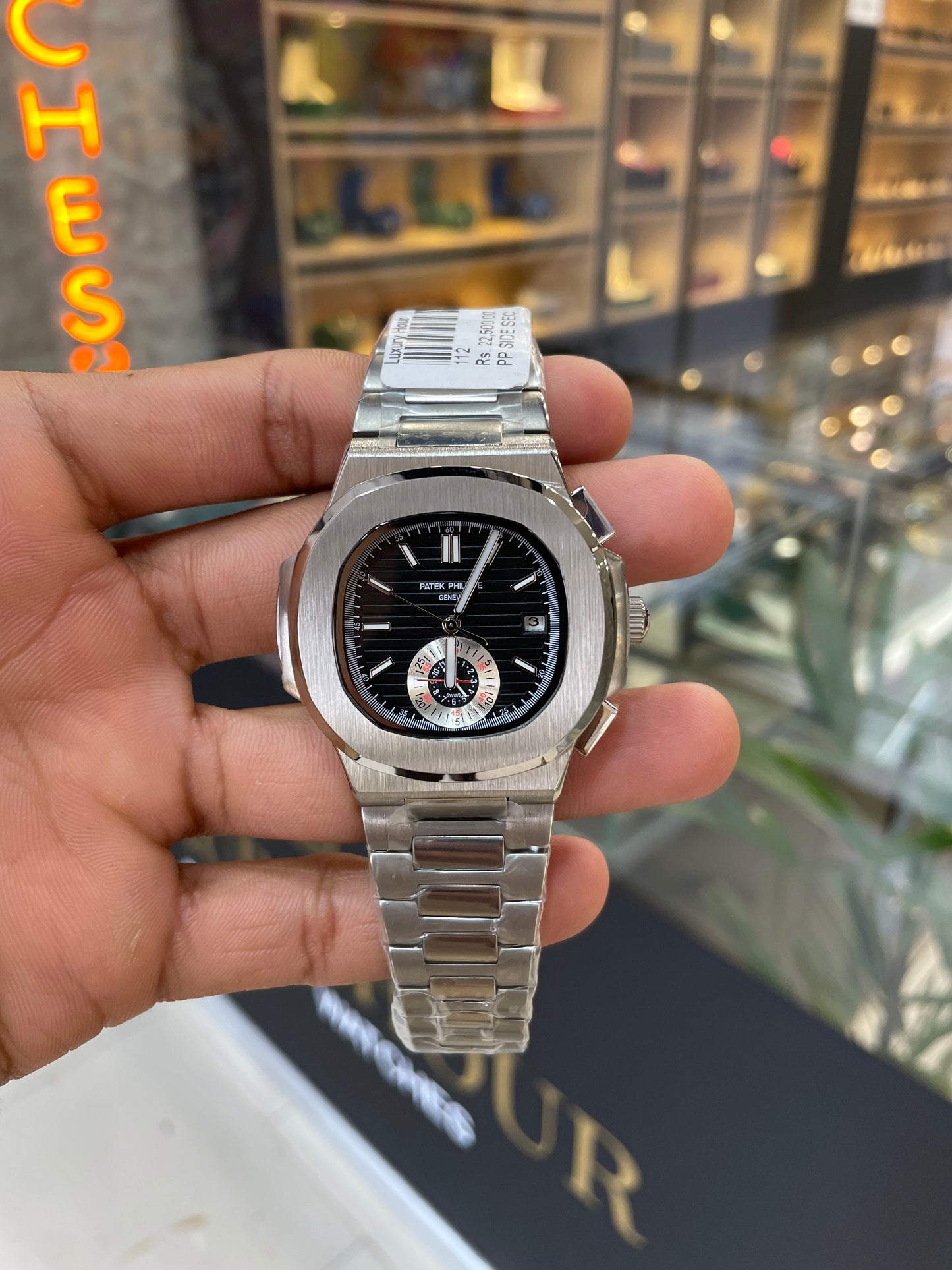 Silver with black dial