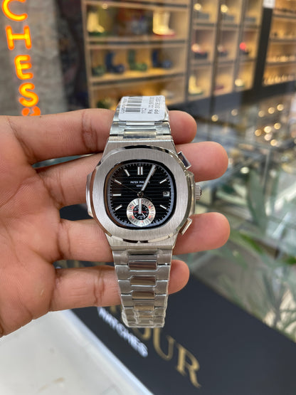 Silver with black dial