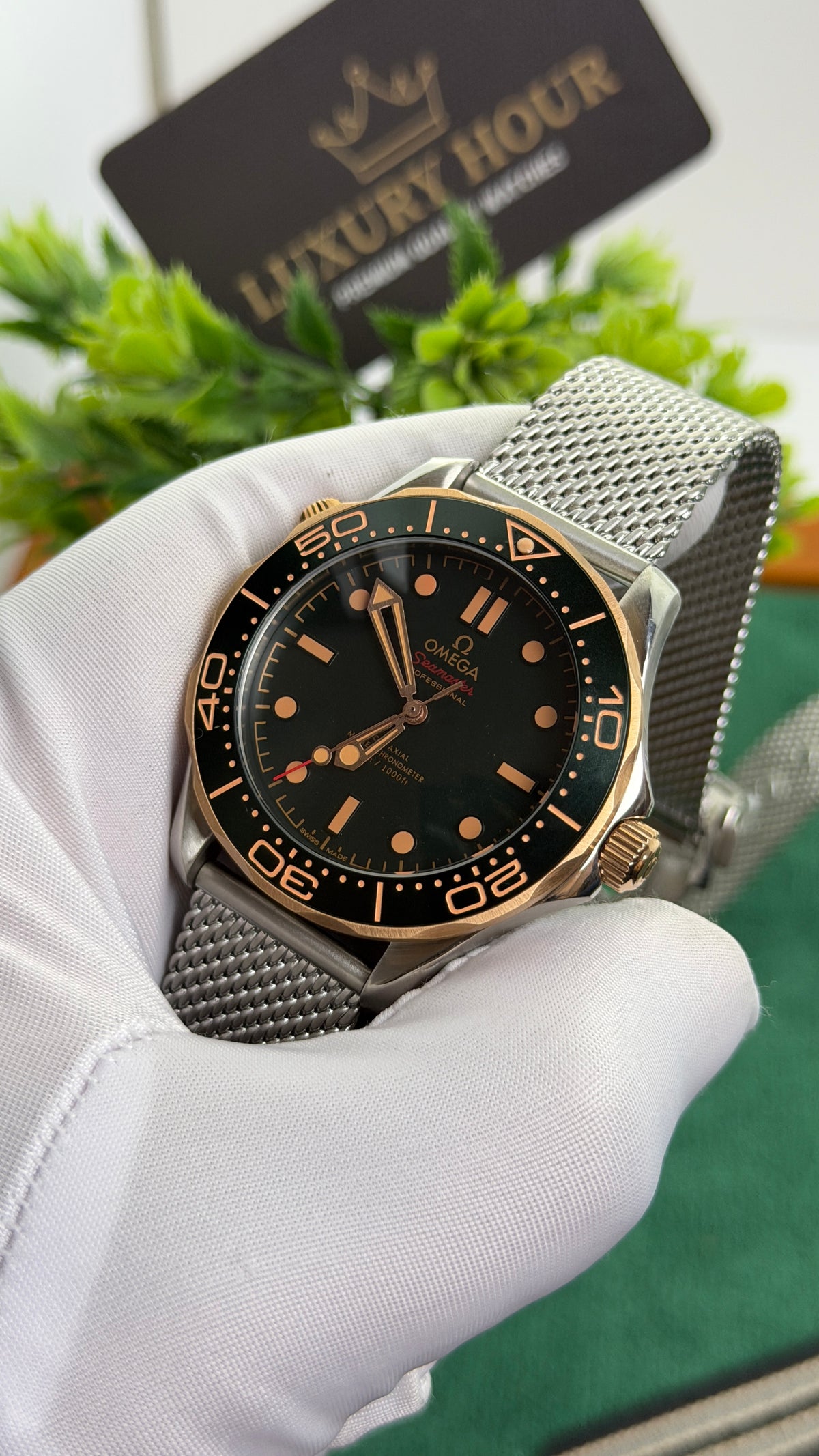 Rose Gold with Dark Green Dial.