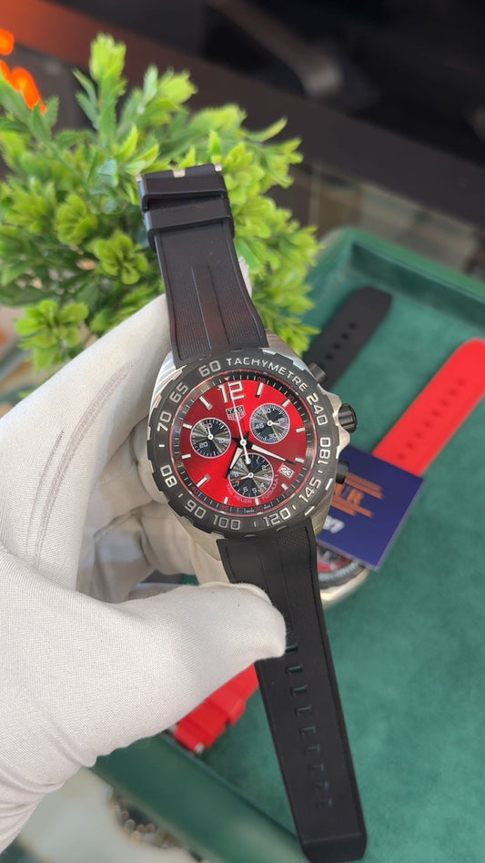 Silver with red dial