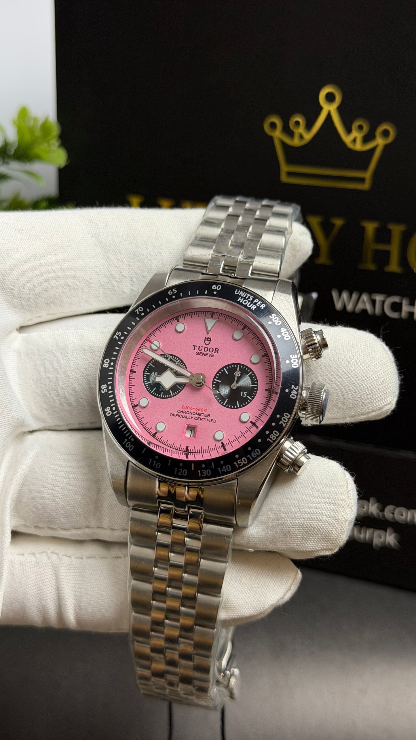 Silver with Pink Dial.