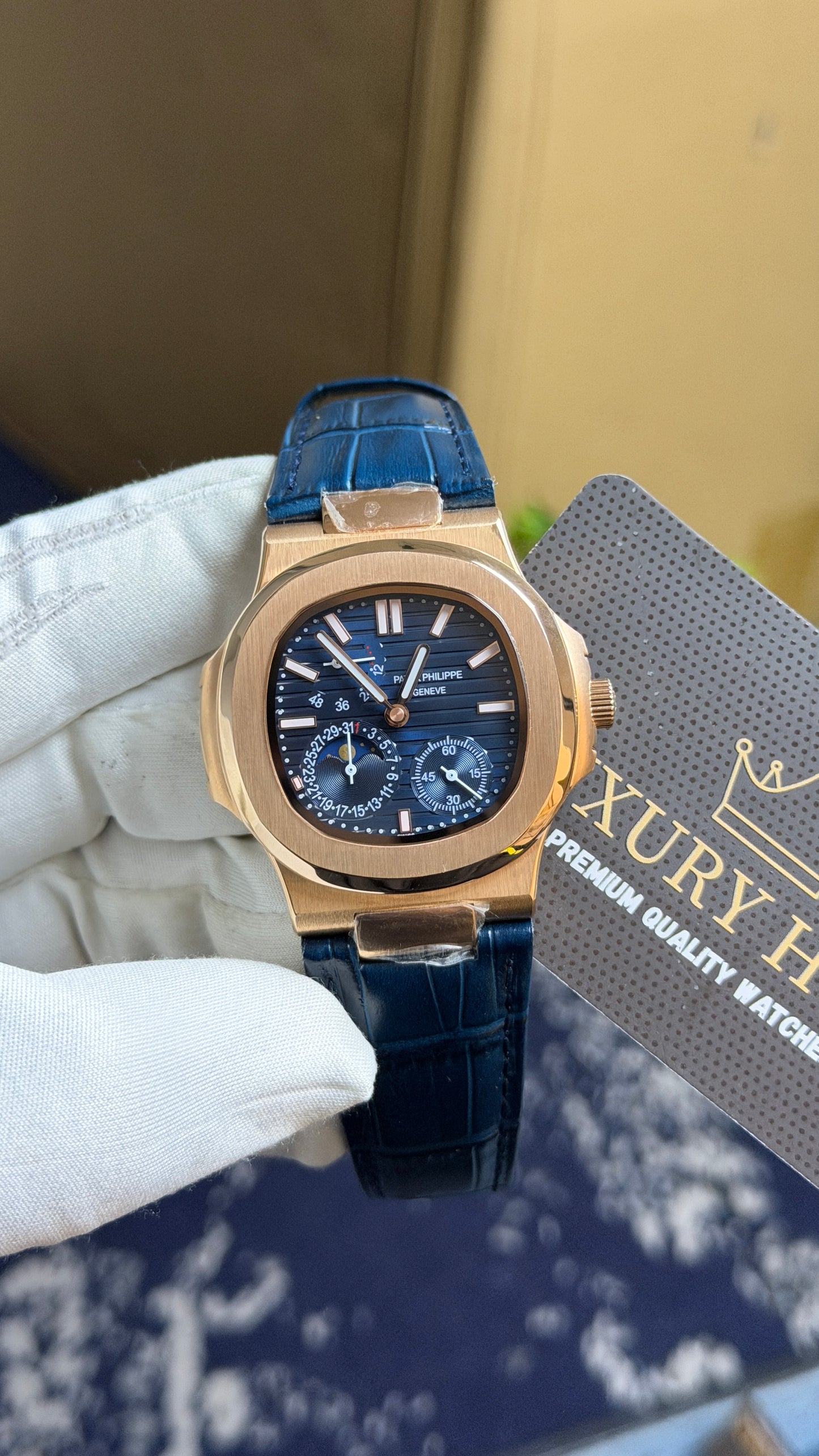Rose Gold with Blue Dial.