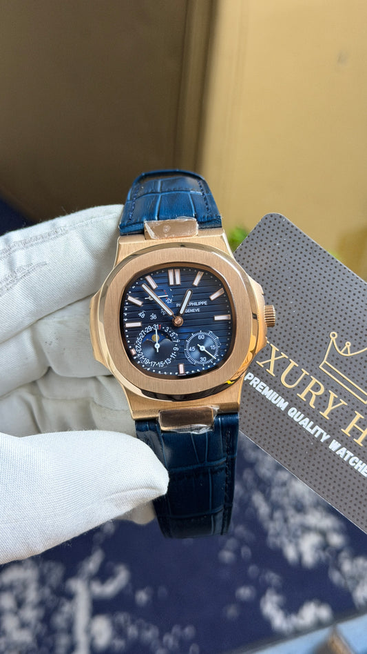 Rose Gold with Blue Dial.