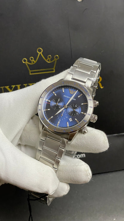 Silver with Blue Dial.