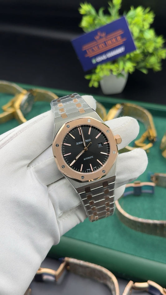 Rose gold two tone with black dial