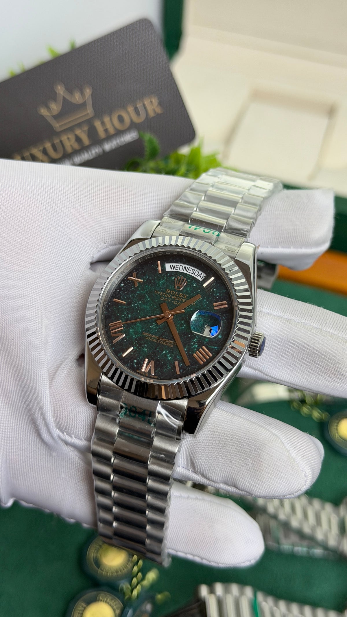 Silver with Green Galaxy Dial.