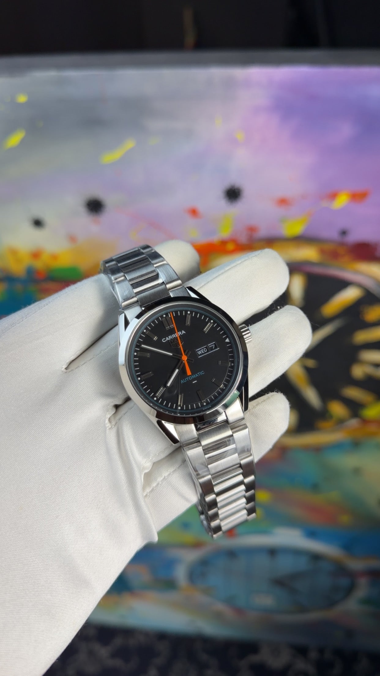 Silver with black dial