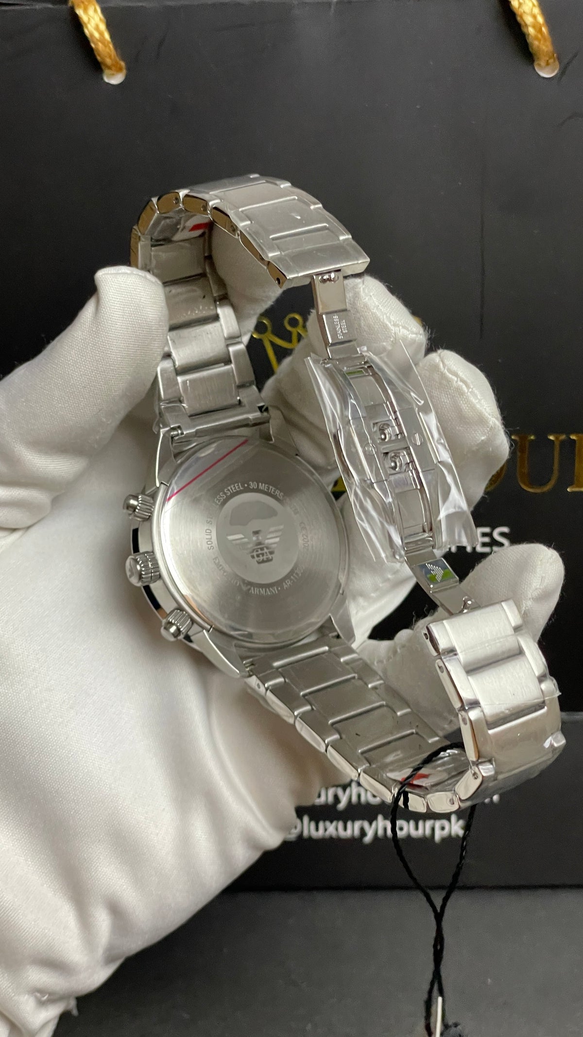 Silver with Blue Dial.