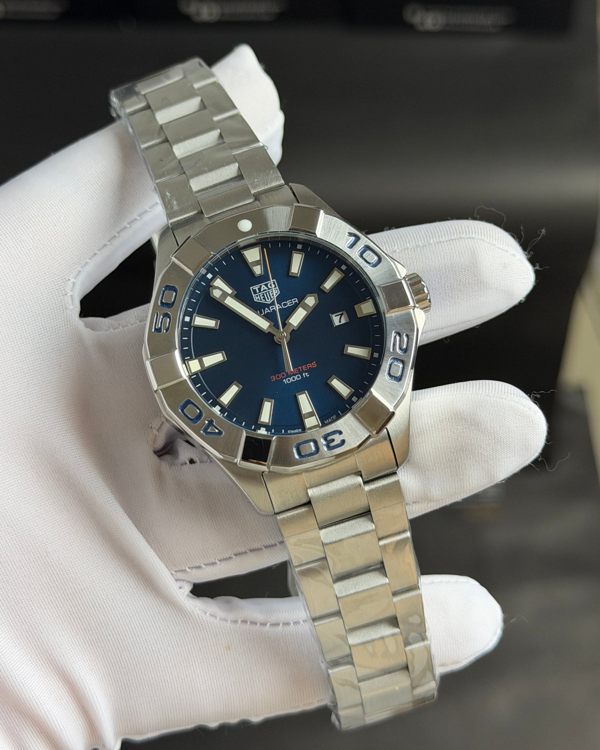 Silver with Blue Dial.