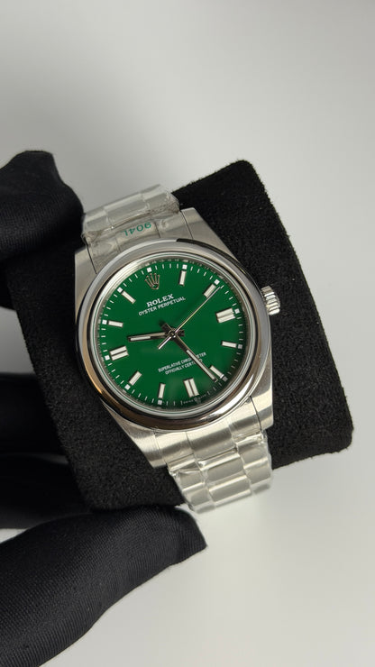 Silver with Green Dial.