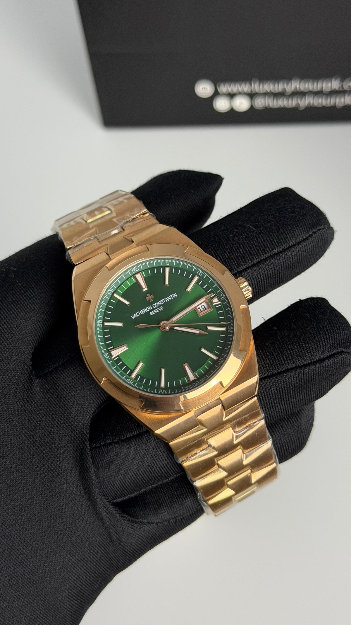Rose Gold with Green Dial.