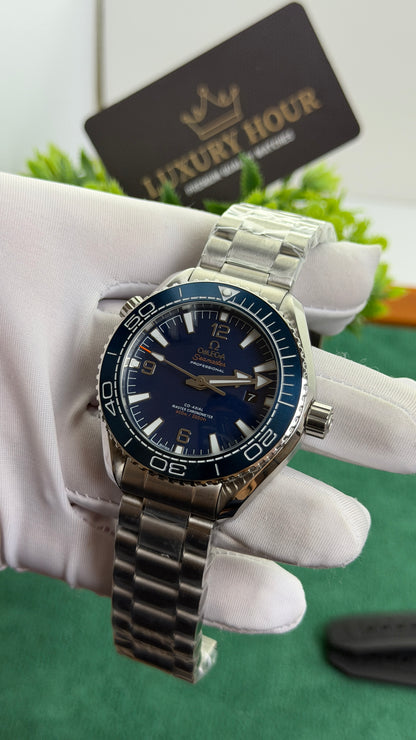 Silver with Blue Dial.