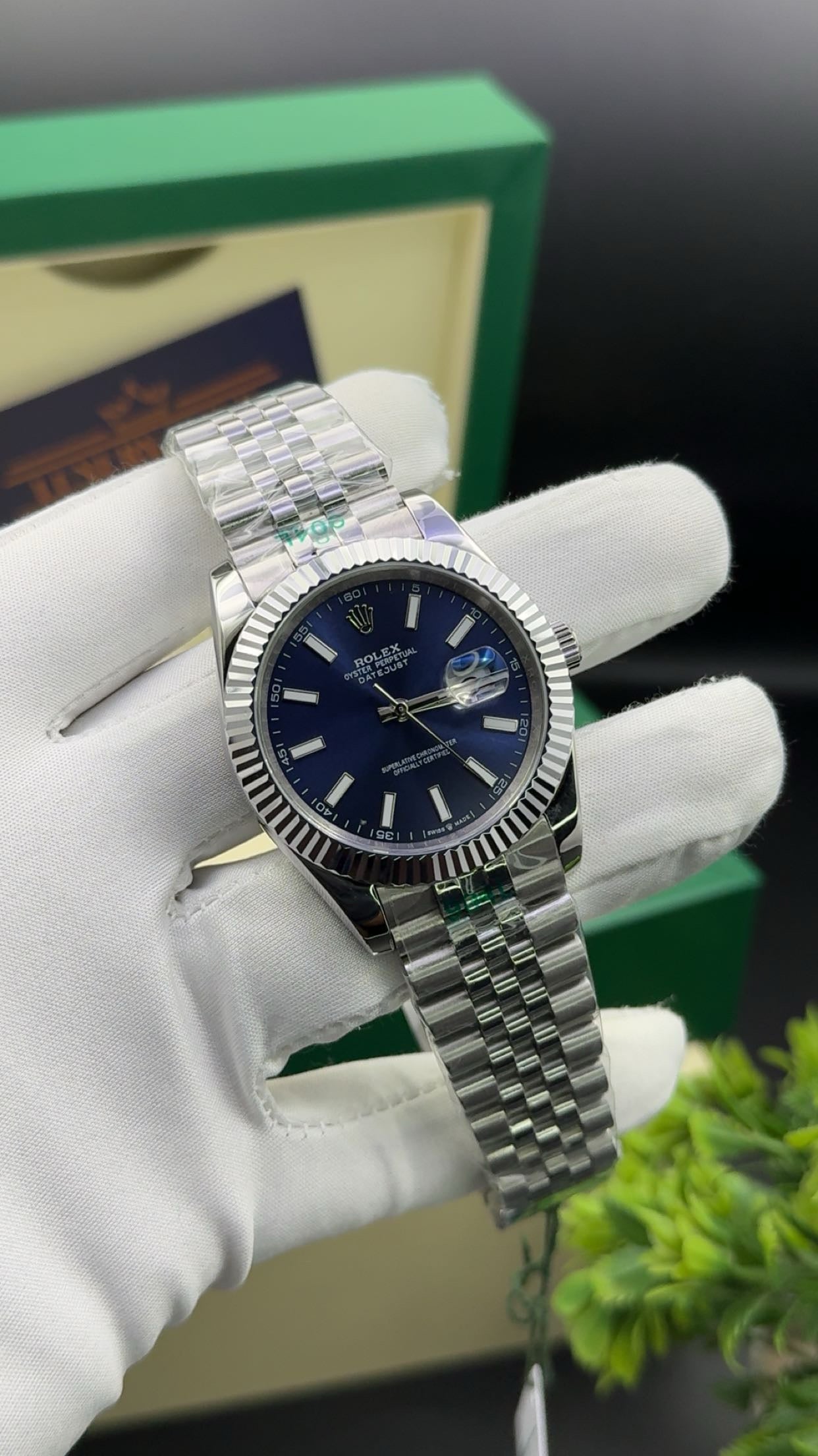 Silver with blue dial